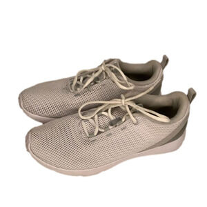 Under Armour white mesh sneakers.